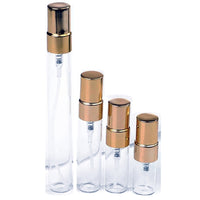 Perfume sample atomisers on white background